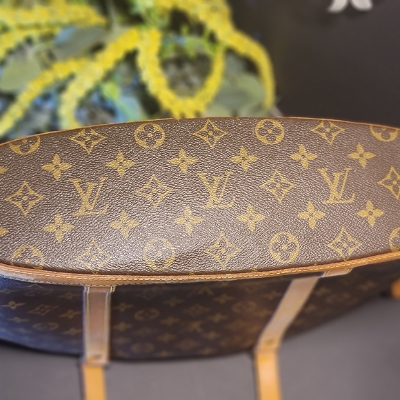 The Iconic Louis Vuitton Babylone Tote - Picture 14 of 14
